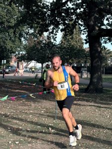Luke De-Benedictis grafting in the Round the Lakes 10k
