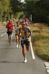 Mike Akers heading down the road in the Totton 10k