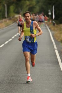Stu Nicholas heading down the road in the Totton 10k